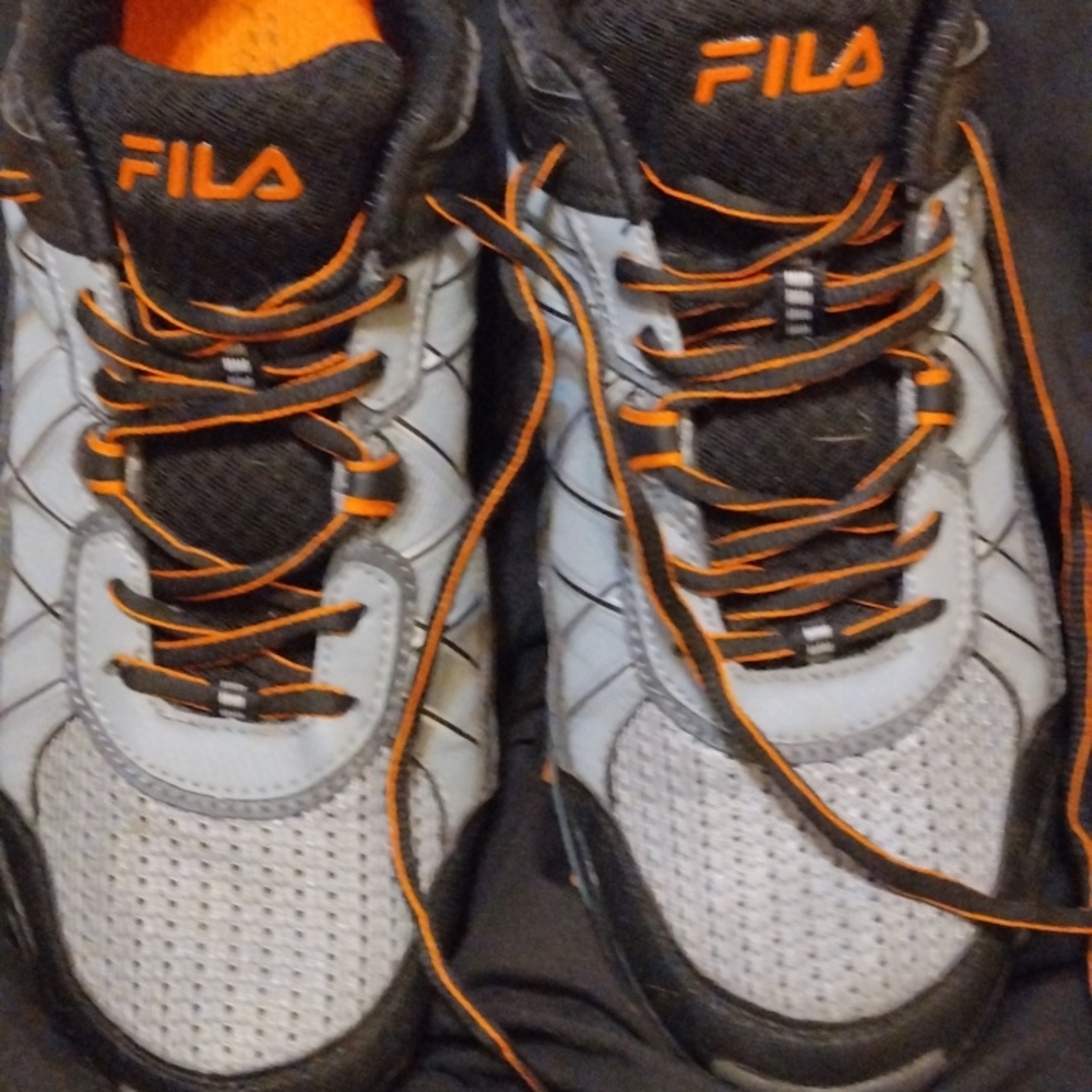 Pair of Fila tennis shoes size 11